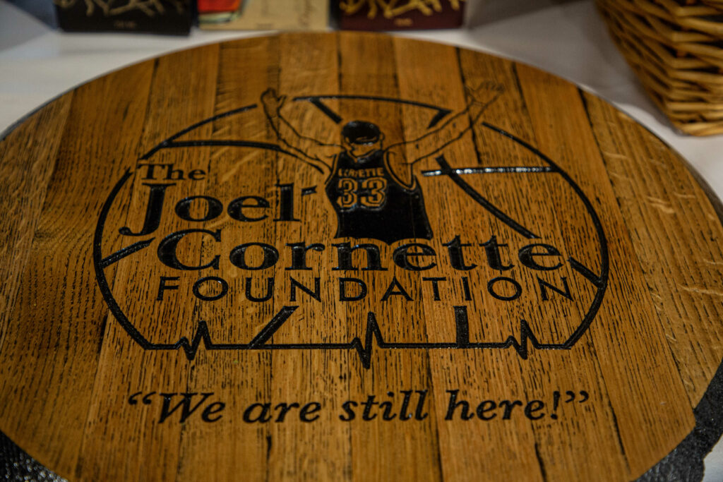 A bourbon barrel with The Joel Cornette Foundation logo and tagline